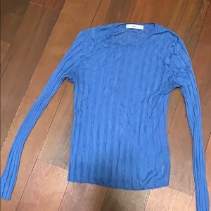 Blue long sleeve top.